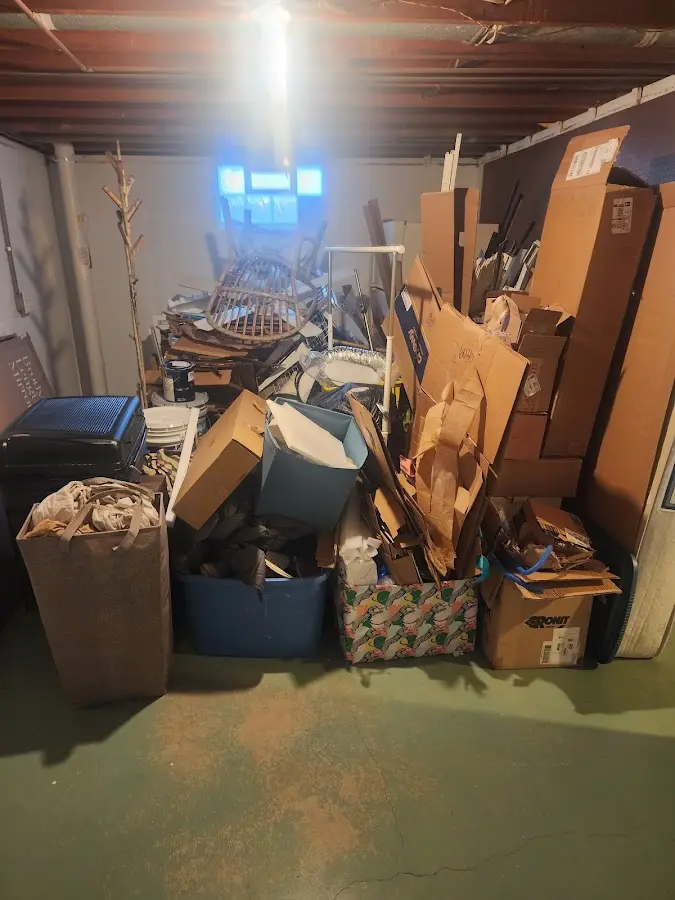 Roll-off dumpster container at job site for Yard Waste Dumpster Rental in Roy